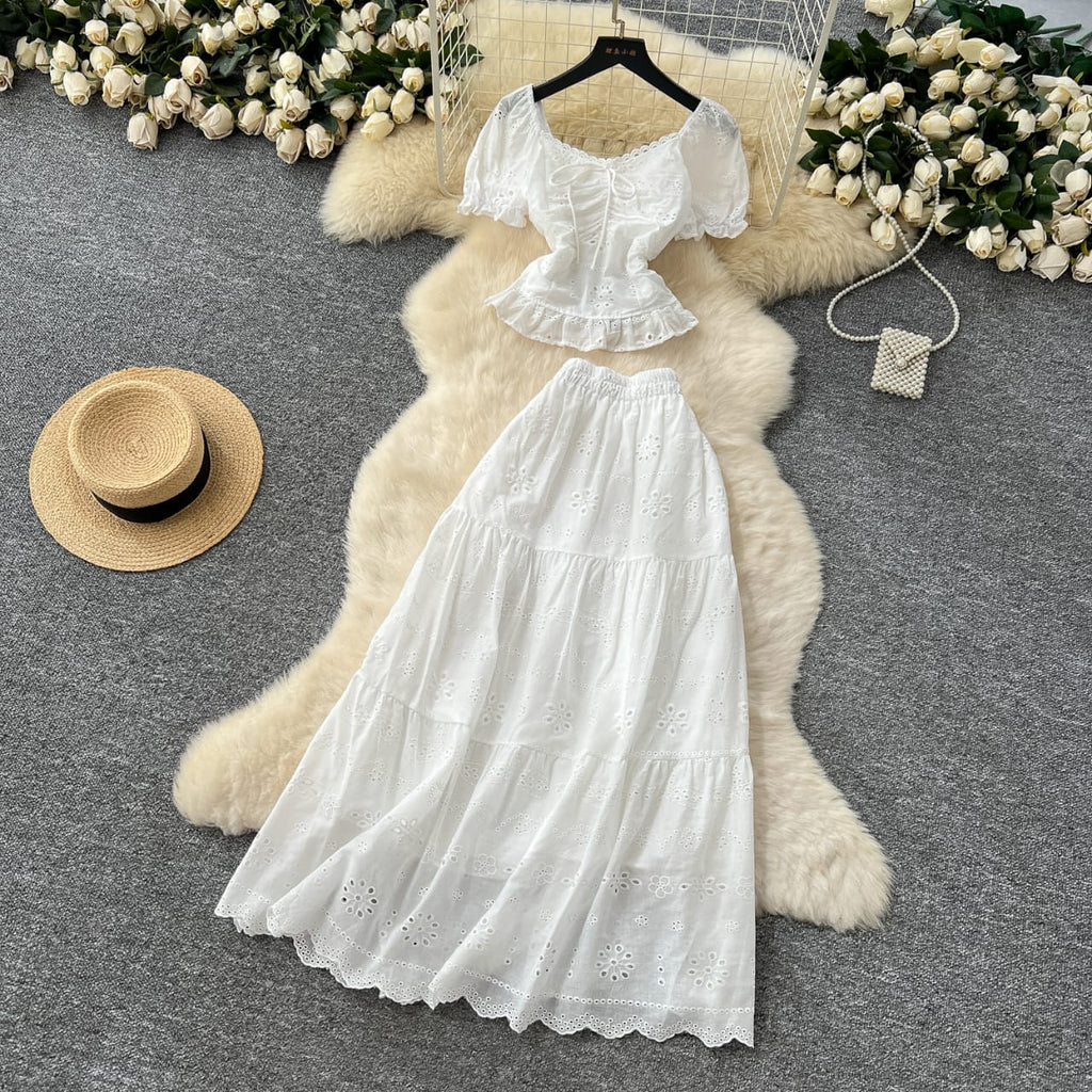 "Elegant White Two-Piece Eyelet Cotton Set – Puff Sleeve Peplum Top & Tiered Maxi Skirt"
