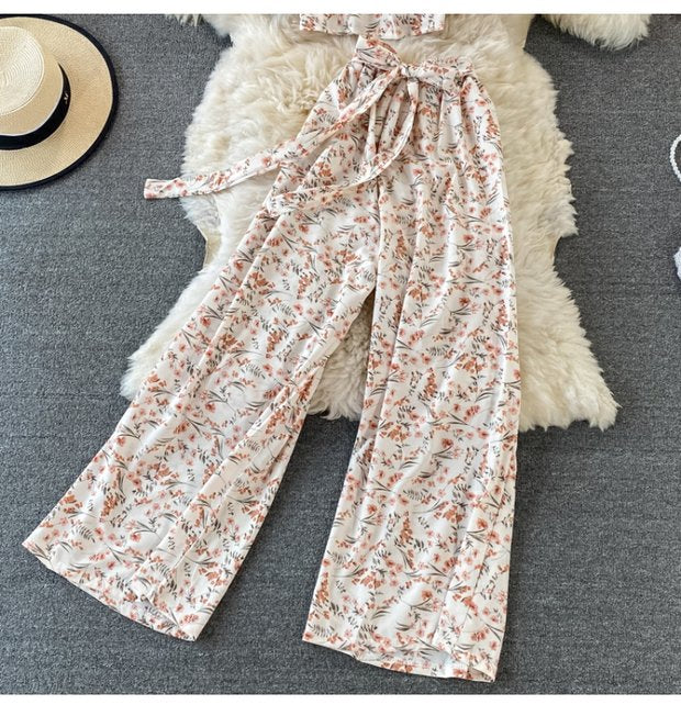 Premium High-Quality Floral Two-Piece Outfit Featuring Delicate Ruffled Crop Top and Graceful Wide-Leg Pants for a Feminine and Stylish Look