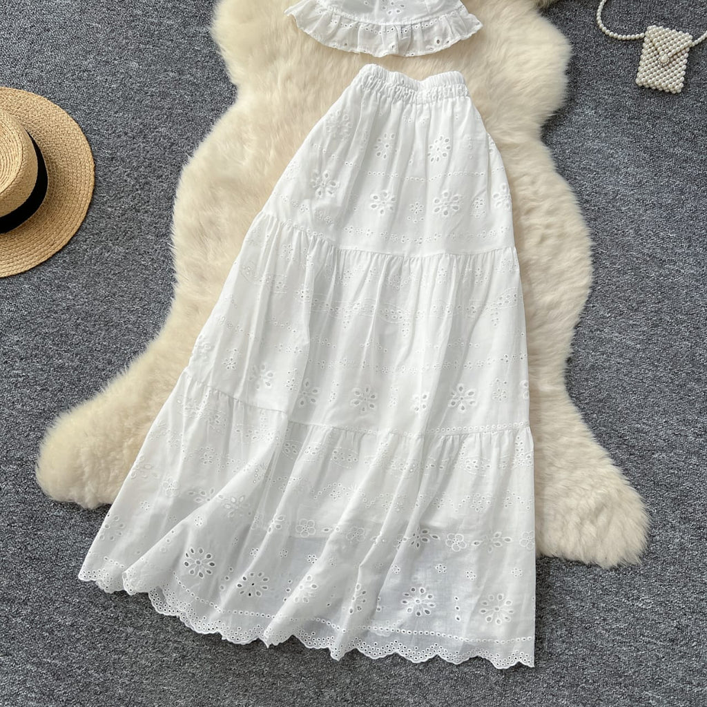 "Elegant White Two-Piece Eyelet Cotton Set – Puff Sleeve Peplum Top & Tiered Maxi Skirt"